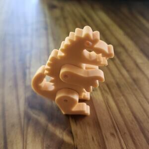 Vtg DINOSAUR ERASER Orange Arvel 1980s Moving Arms Legs Reptar Unused